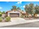 Single-story home with two-car garage, desert landscaping, and covered entry at 3920 Autumn St, Las Vegas, NV 89120