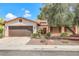 Charming single-story home featuring a well-maintained front yard, brown shutters, and a two-car garage at 3920 Autumn St, Las Vegas, NV 89120