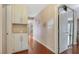 Hallway with hardwood flooring, built in storage, and neutral paint at 3920 Autumn St, Las Vegas, NV 89120