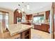 A spacious kitchen showcasing a granite island, stainless steel appliances, and ample cabinet storage space at 3920 Autumn St, Las Vegas, NV 89120