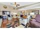 Bright open living space with hardwood floors, a large sectional sofa, and modern decor at 3920 Autumn St, Las Vegas, NV 89120