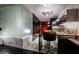 Modern kitchen with stainless steel appliances and a breakfast bar at 4381 W Flamingo Rd # 1212, Las Vegas, NV 89103