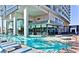Inviting pool area with comfortable lounge chairs and shallow wading areas, perfect for relaxation at 4381 W Flamingo Rd # 1212, Las Vegas, NV 89103