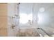 Elegant marble shower with modern fixtures and glass door at 4381 W Flamingo Rd # 1212, Las Vegas, NV 89103