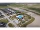 Aerial view of neighborhood amenities featuring pools, playgrounds, green spaces, and walking trails at 4510 E Brusca Way, Pahrump, NV 89061