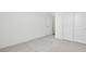 Bright bedroom with neutral carpet, white walls, and closet doors creates a serene and versatile space at 4510 E Brusca Way, Pahrump, NV 89061