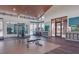 Community gym with exercise equipment, floor to ceiling mirrors, and large windows at 4510 E Brusca Way, Pahrump, NV 89061