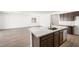 Kitchen with a center island, stainless steel appliances, and spacious layout at 4510 E Brusca Way, Pahrump, NV 89061