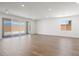 Bright living room with large sliding glass doors offering ample natural light at 4510 E Brusca Way, Pahrump, NV 89061