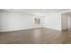 Bright living room featuring hardwood floors and a window for ample natural light at 4510 E Brusca Way, Pahrump, NV 89061