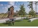 Community playground featuring play structure, tables, seating and artificial grass at 4510 E Brusca Way, Pahrump, NV 89061