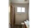 Bathroom with a shower, toilet, sink, window for natural light, and towel bar at 4931 Crystal Breeze Ln, North Las Vegas, NV 89031