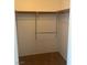 A standard closet includes a wooden shelf and a hanging rod for easy storage at 4931 Crystal Breeze Ln, North Las Vegas, NV 89031