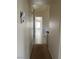 Hallway with view of living room area with natural light at 4931 Crystal Breeze Ln, North Las Vegas, NV 89031