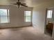 Expansive main bedroom with multiple windows and an attached ensuite bathroom at 4931 Crystal Breeze Ln, North Las Vegas, NV 89031