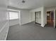 Bedroom with natural light, mirrored closet, and neutral décor at 5043 Spencer St # A, Las Vegas, NV 89119