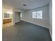 Cozy bedroom featuring a mirrored closet and an ensuite bathroom at 5043 Spencer St # A, Las Vegas, NV 89119