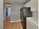 Kitchen area with modern appliances and light-colored cabinetry at 5043 Spencer St # A, Las Vegas, NV 89119