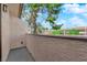 Private balcony with textured walls, and a scenic view of the surrounding neighborhood at 5241 Janfred Ct # 26, Las Vegas, NV 89103