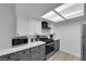 Bright kitchen featuring stainless steel appliances and sleek countertops providing ample space at 5241 Janfred Ct # 26, Las Vegas, NV 89103