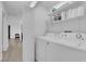 Convenient laundry room featuring modern appliances and ample storage space for ease of use at 5241 Janfred Ct # 26, Las Vegas, NV 89103