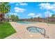 Community pool area featuring a swimming pool and a built-in hot tub at 5241 Janfred Ct # 26, Las Vegas, NV 89103