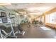 Bright gym offers modern equipment, weights, and a spiral staircase to other levels at 59 E Agate Ave # 406, Las Vegas, NV 89123