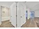 Hallway with doors to bathroom and balcony at 59 E Agate Ave # 406, Las Vegas, NV 89123