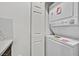 Laundry room with stackable washer and dryer at 59 E Agate Ave # 406, Las Vegas, NV 89123