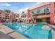 Beautiful pool featuring crystal clear water and convenient lounge chairs and umbrellas at 59 E Agate Ave # 406, Las Vegas, NV 89123