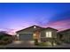 Charming single-story home with a well-manicured lawn and inviting curb appeal at 5918 Peridot Falls Ave, Las Vegas, NV 89130