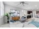 Spacious living room with an open floor plan, stylish decor, and comfortable seating at 5918 Peridot Falls Ave, Las Vegas, NV 89130