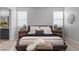 Comfortable main bedroom showcasing a plush bed, stylish bedside tables, and calming decor at 5918 Peridot Falls Ave, Las Vegas, NV 89130