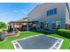 This property offers a fire pit, BBQ area, bar seating, hot tub and trampoline for outdoor recreation at 5976 Rockway Glen Ave, Las Vegas, NV 89141