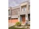 Contemporary home featuring a two-car garage, stone accents, and a welcoming front entrance at 5976 Rockway Glen Ave, Las Vegas, NV 89141