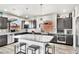 Well-appointed kitchen featuring a granite island, stainless steel appliances, and modern cabinetry at 5976 Rockway Glen Ave, Las Vegas, NV 89141
