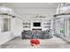 Elegant living room with a modern ceiling fan, fireplace, and mounted television at 5976 Rockway Glen Ave, Las Vegas, NV 89141