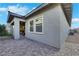 Spacious backyard features a covered patio and brick pavers at 712 Webber Park St, Henderson, NV 89011