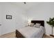Cozy bedroom with neutral decor, a comfortable bed, and a full closet at 712 Webber Park St, Henderson, NV 89011