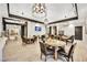 Stylish dining area with modern lighting and comfortable seating, ideal for casual meals and entertaining guests at 712 Webber Park St, Henderson, NV 89011