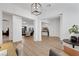 Open foyer with hardwood floors, neutral colors, and views to the living areas at 712 Webber Park St, Henderson, NV 89011
