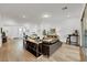 Spacious living room boasts hardwood floors, neutral decor, and plenty of natural light at 712 Webber Park St, Henderson, NV 89011