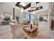 Elegant living room with stylish furniture and abundant natural light, offering a comfortable and inviting atmosphere at 712 Webber Park St, Henderson, NV 89011