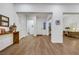 Open living area with light wood floors, neutral walls, and versatile design, perfect for customization at 712 Webber Park St, Henderson, NV 89011