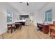 Open concept living area featuring wood floors and a combined living space at 712 Webber Park St, Henderson, NV 89011
