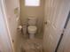 Cozy bathroom featuring marble floors, a toilet, and a towel rack at 7313 Bosky Springs St, Las Vegas, NV 89131