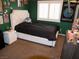 Cozy bedroom with carpet, a window with shutters, and a comfortable bed at 7313 Bosky Springs St, Las Vegas, NV 89131
