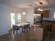Eat-in kitchen area with stainless appliances, island and tile flooring at 7313 Bosky Springs St, Las Vegas, NV 89131