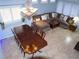 Comfortable living room featuring a large sectional couch with throw pillows and dining room at 7313 Bosky Springs St, Las Vegas, NV 89131
