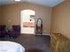 Spacious main bedroom featuring a sitting area, dresser and ensuite bathroom at 7313 Bosky Springs St, Las Vegas, NV 89131